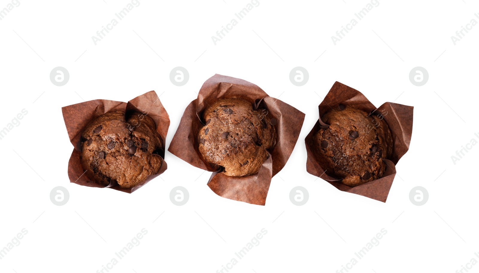 Photo of Delicious sweet muffins with chocolate chips isolated on white, top view