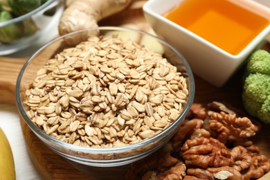 Photo of Different fresh products rich in melatonin on white table, closeup