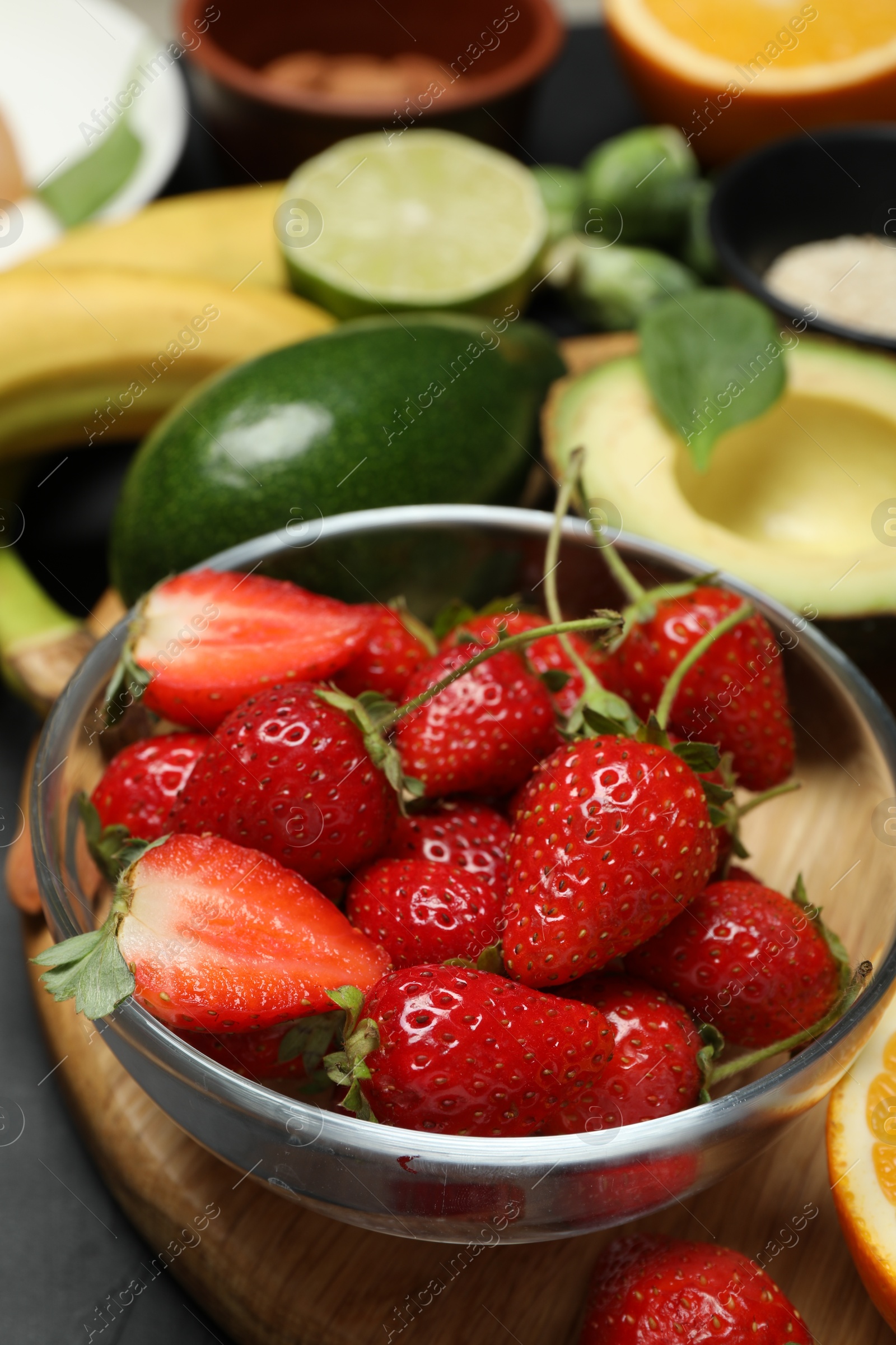 Photo of Different fresh products rich in dopamine on grey table, closeup