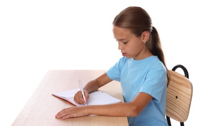 Photo of Girl with correct posture and notebook sitting at wooden desk on white background