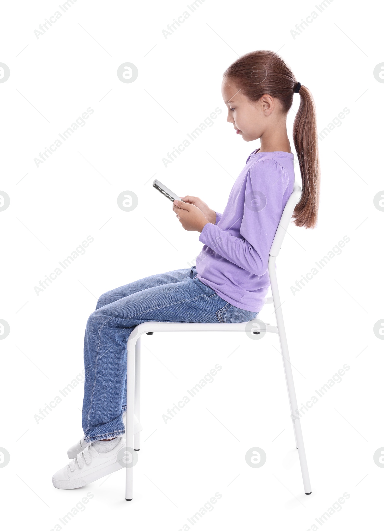 Photo of Girl with correct posture and smartphone sitting on white background