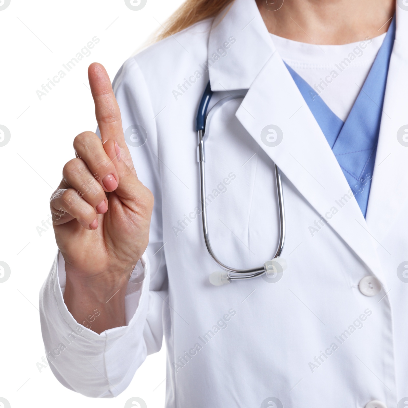 Photo of Doctor with stethoscope pointing at something on white background, closeup