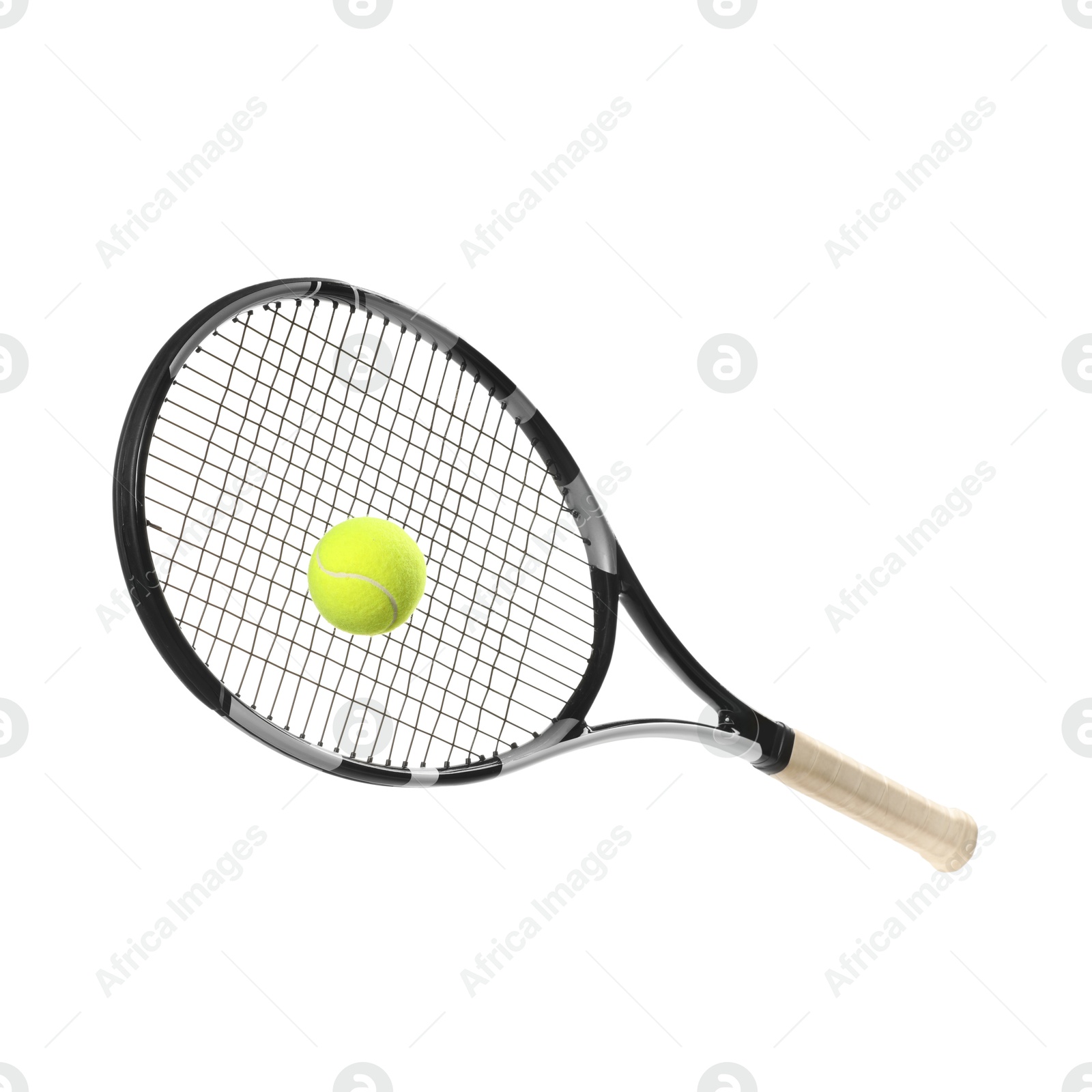 Photo of Tennis racket with ball isolated on white