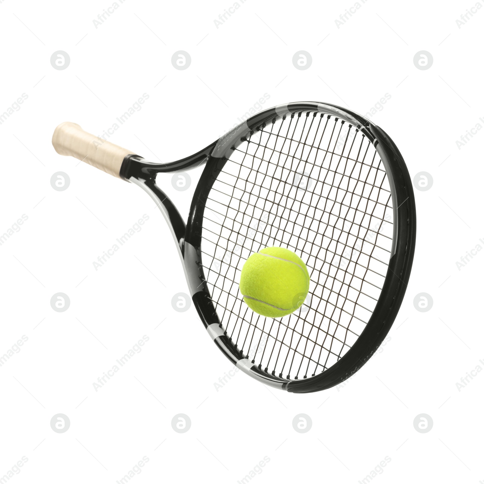 Photo of Tennis racket with ball isolated on white