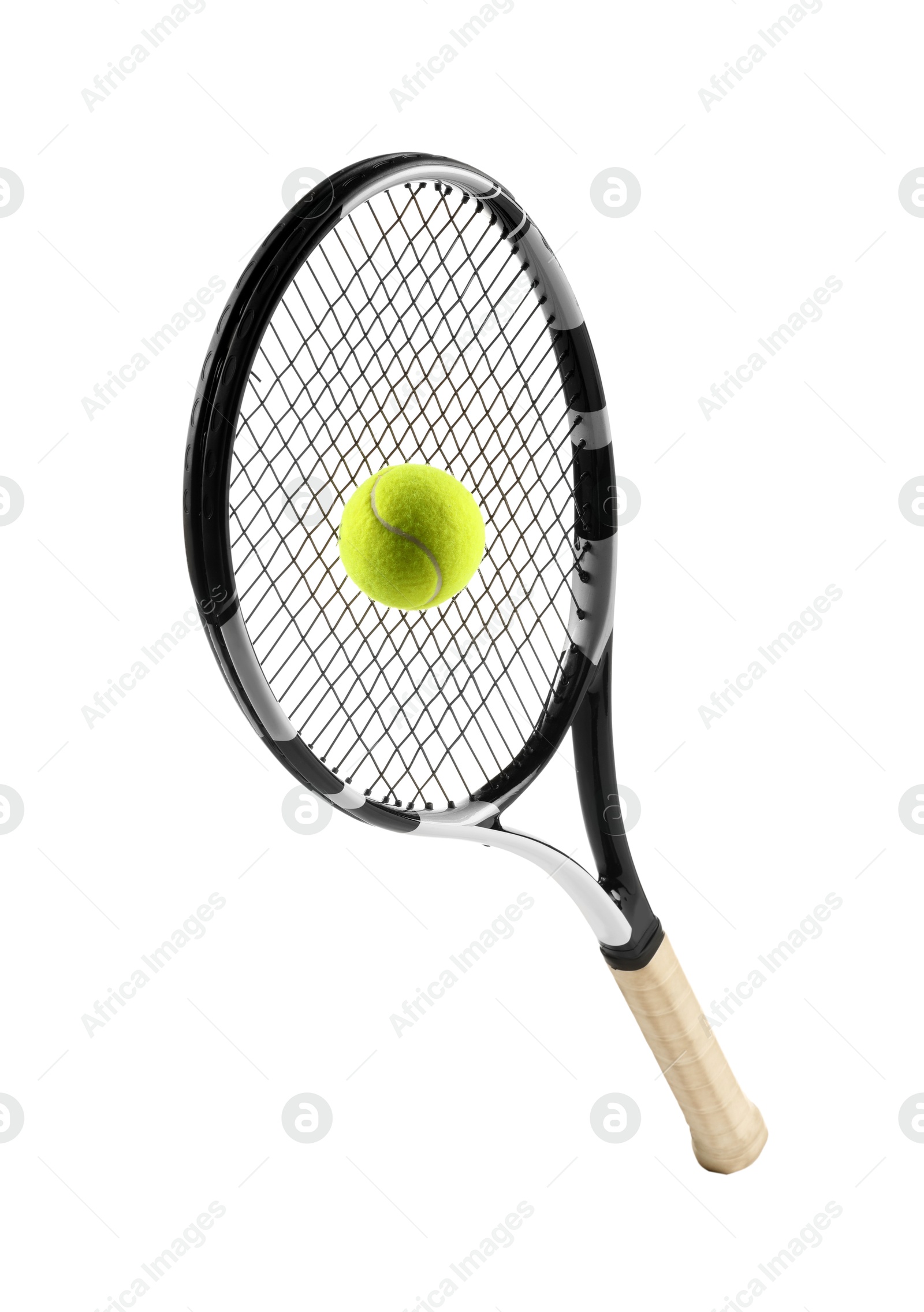 Photo of Tennis racket with ball isolated on white