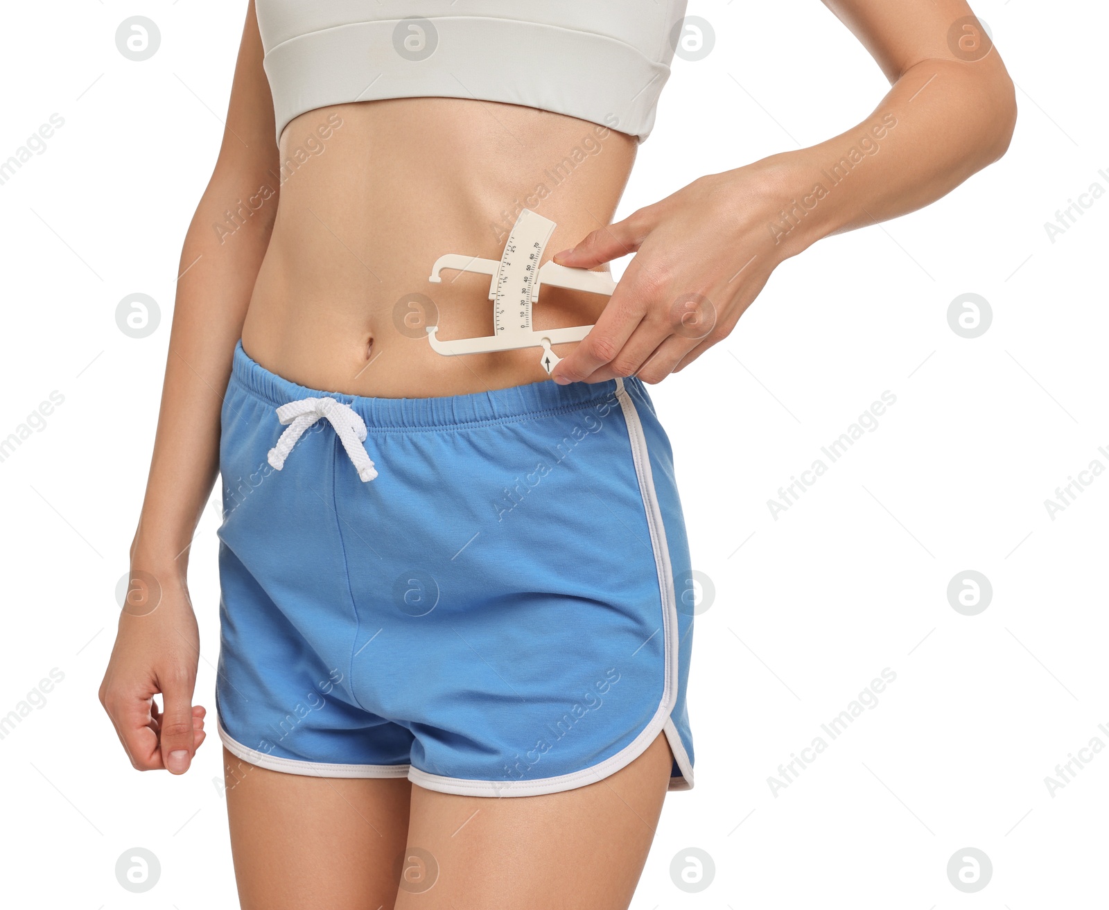 Photo of Woman measuring body fat with caliper on white background, closeup