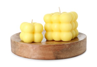 Photo of Two yellow bubble candles isolated on white