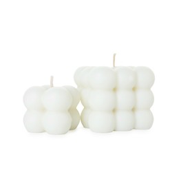 Photo of Two beautiful bubble candles isolated on white