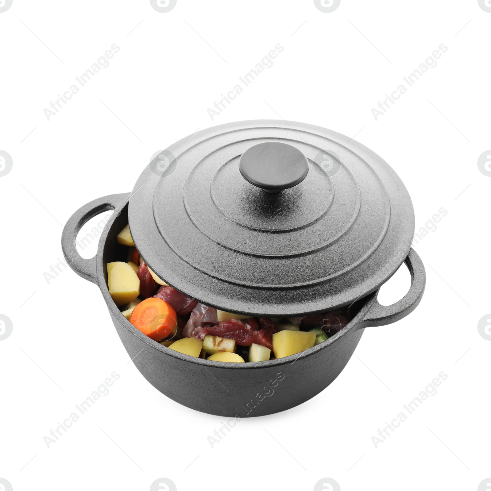 Photo of Cooking stew. Uncooked meat and vegetables in pot isolated on white