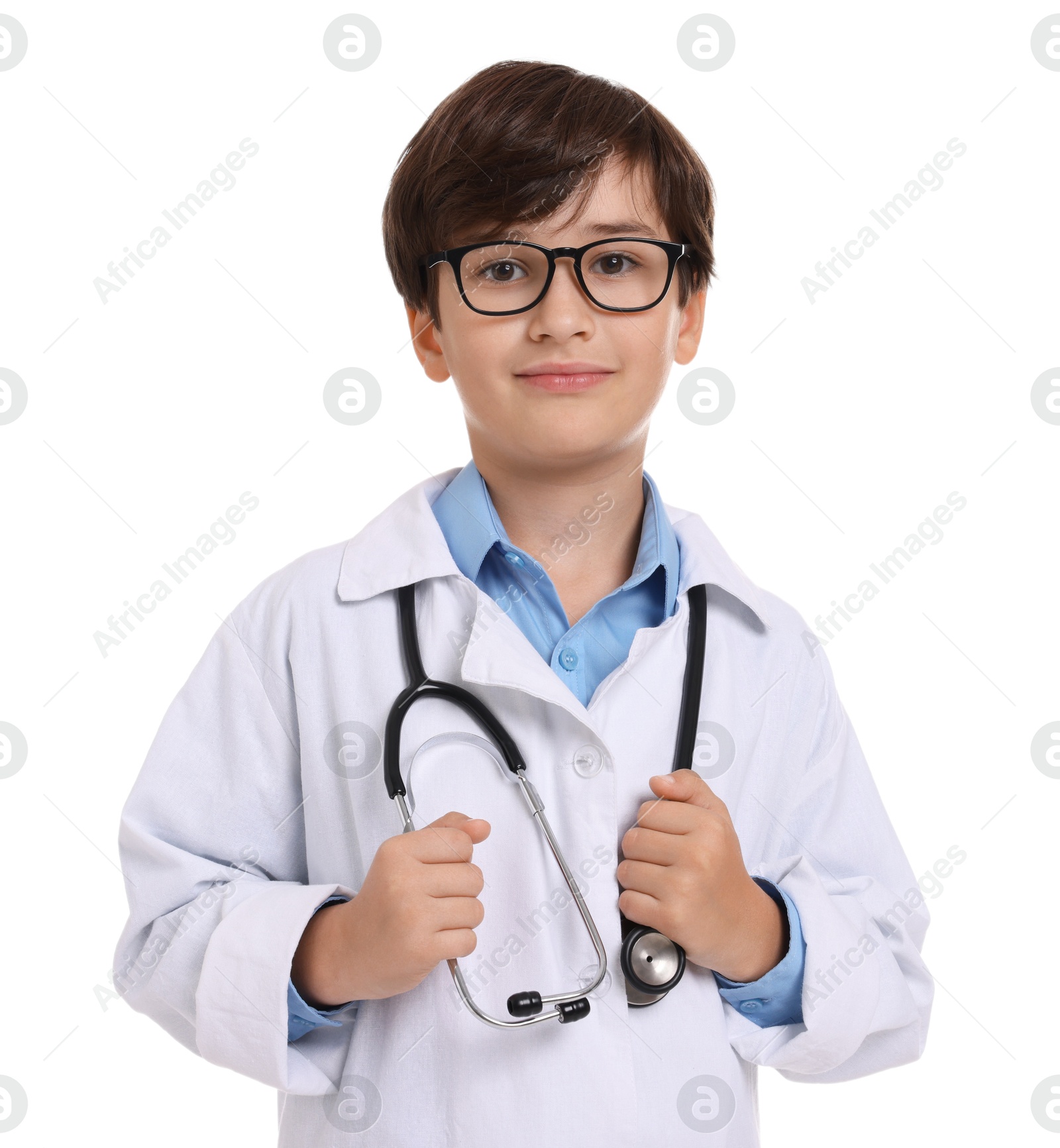 Photo of Boy with stethoscope pretending to be doctor on white background. Dreaming of future profession