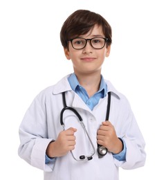 Photo of Boy with stethoscope pretending to be doctor on white background. Dreaming of future profession