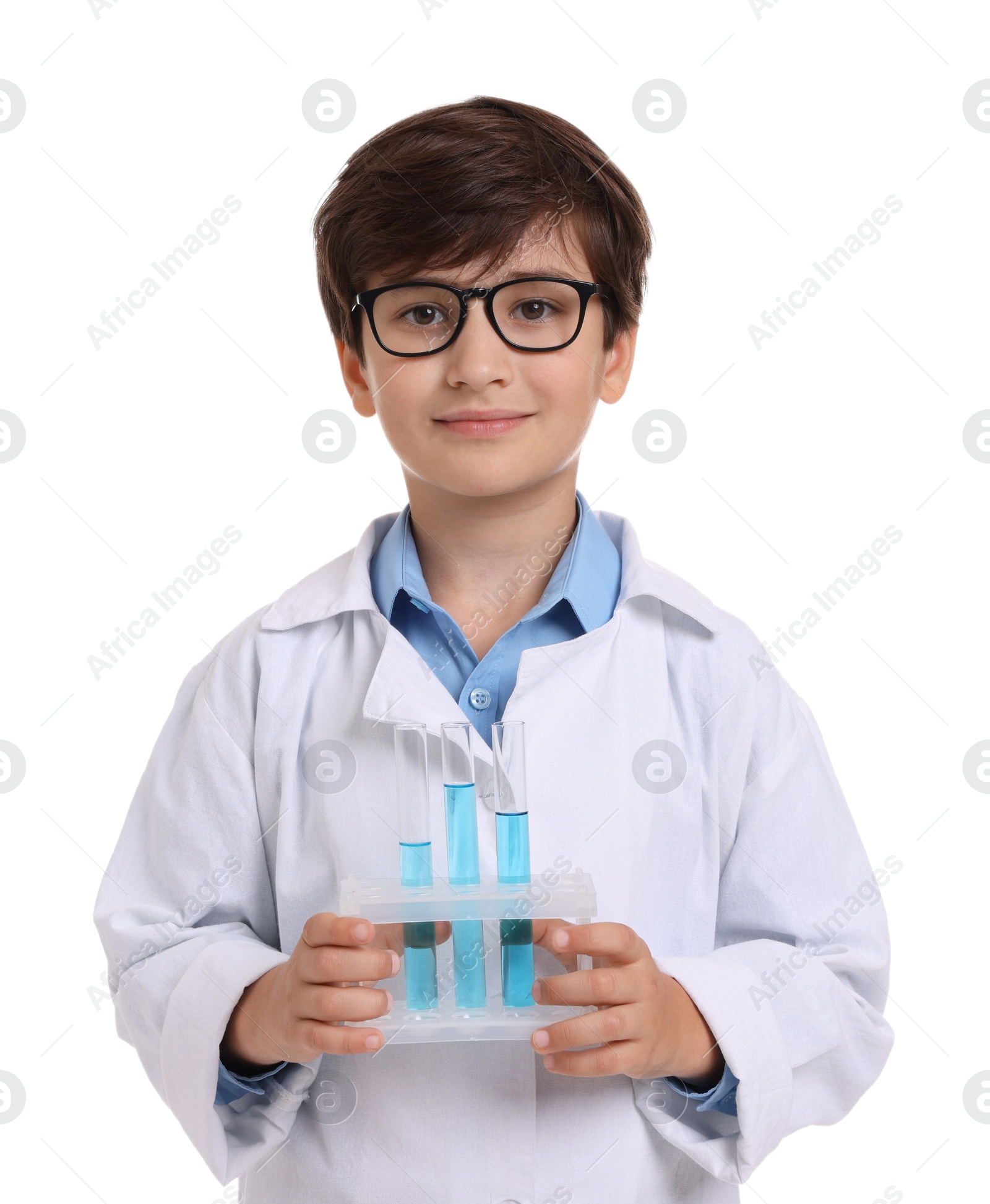 Photo of Boy with test tubes pretending to be scientist on white background. Dreaming of future profession