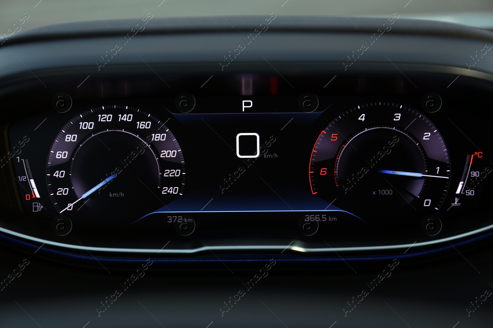 Photo of Speedometer on dashboard inside of modern luxury car, closeup