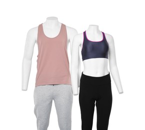 Female and male mannequins with stylish sportswear isolated on white