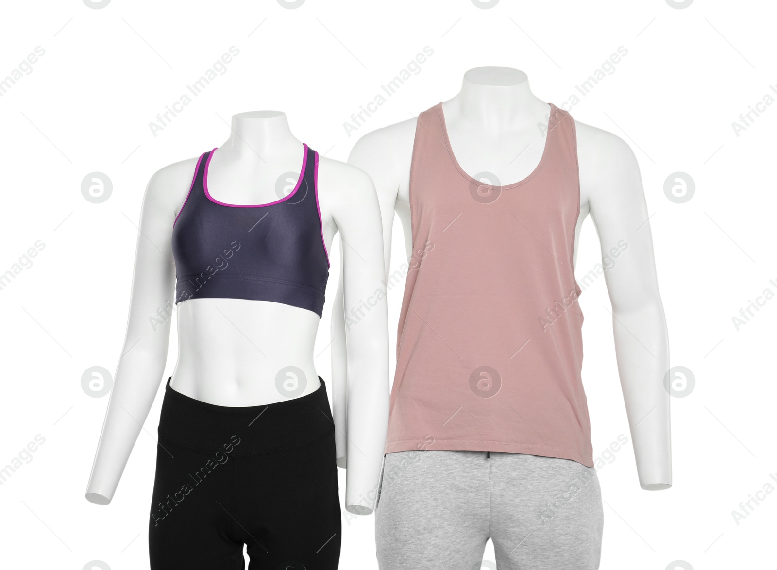 Photo of Female and male mannequins with stylish sportswear isolated on white