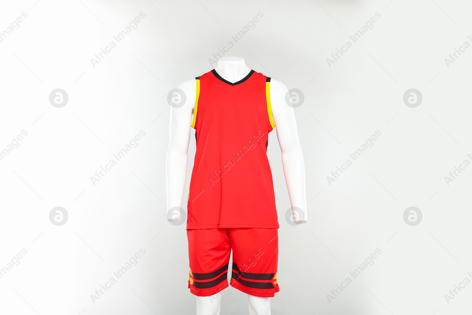 Photo of Male mannequin with stylish sports outfit on light grey background