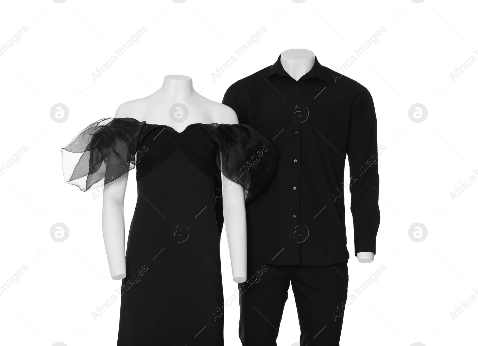 Photo of Female and male mannequins with stylish outfits isolated on white