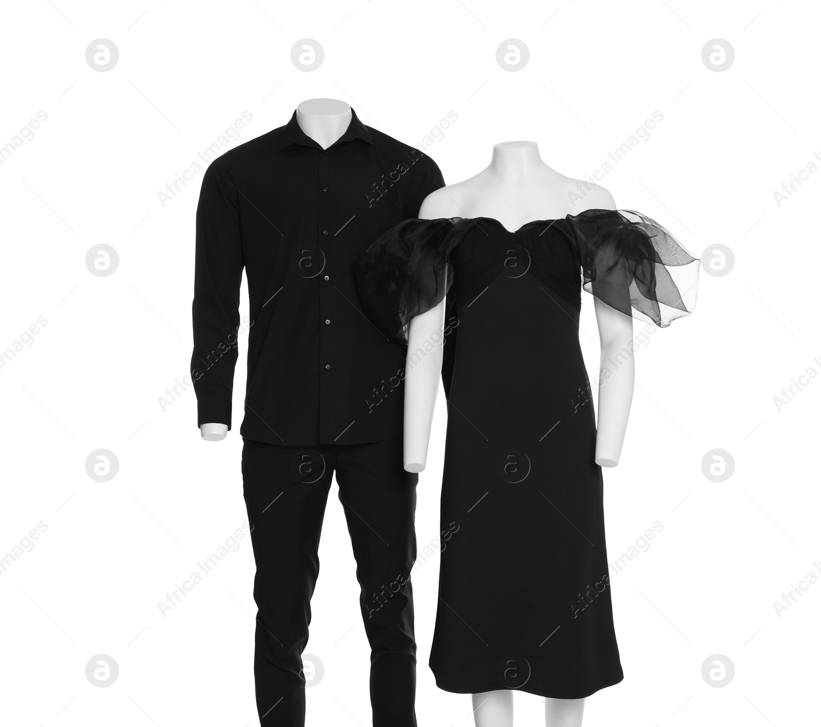 Photo of Female and male mannequins with stylish outfits isolated on white