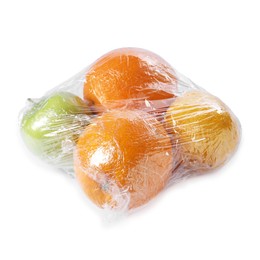 Photo of Fresh fruits with plastic food wrap isolated on white