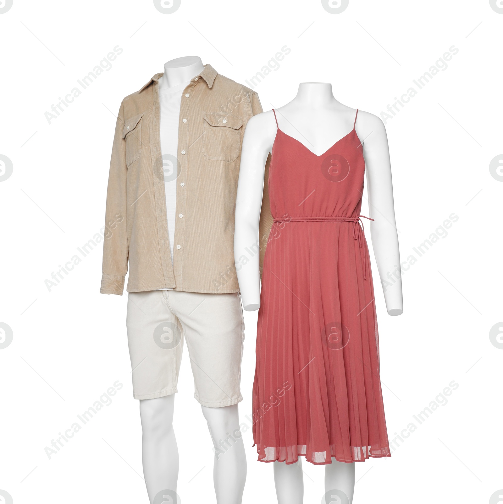 Photo of Female and male mannequins with stylish outfits isolated on white