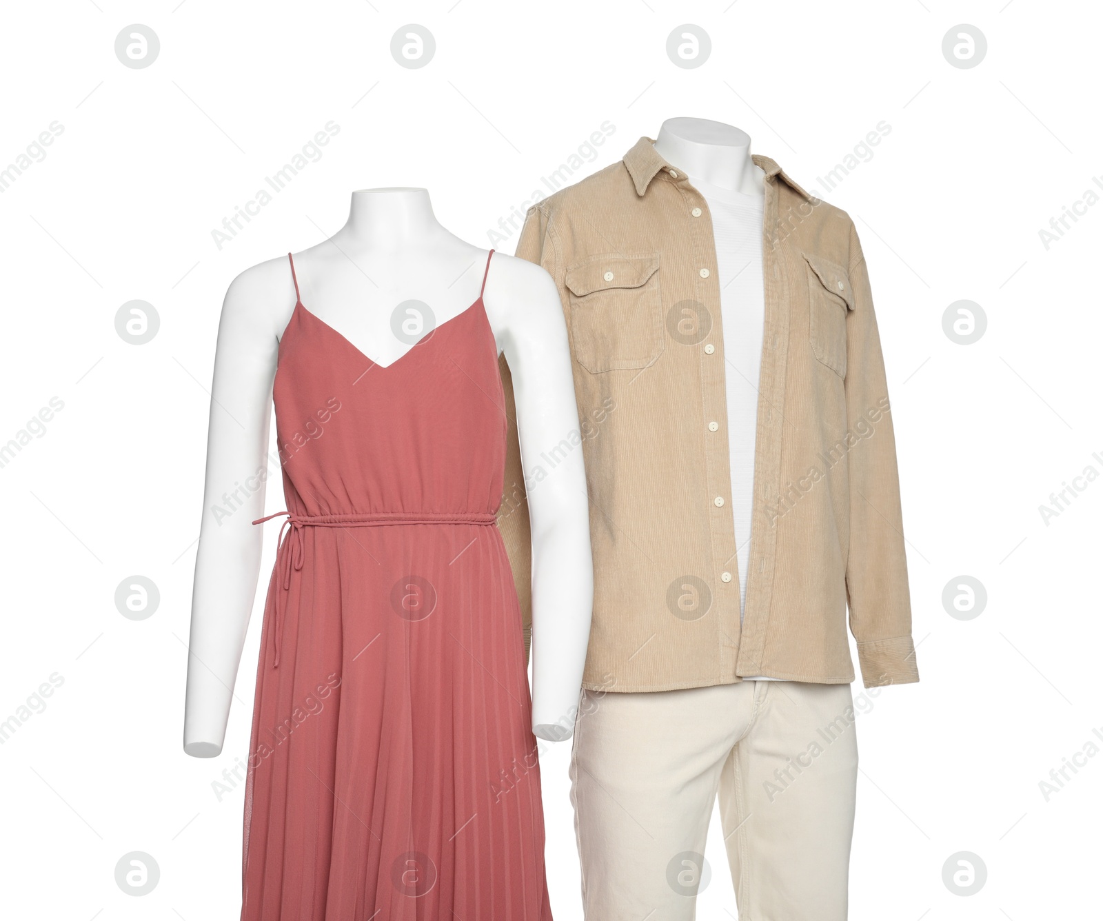 Photo of Female and male mannequins with stylish outfits isolated on white