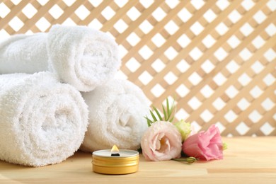 Photo of Composition with cosmetic products for spa treatment on wooden table, space for text