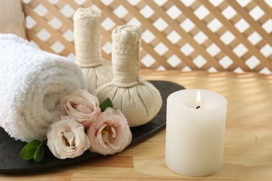 Composition with cosmetic products for spa treatment on wooden table