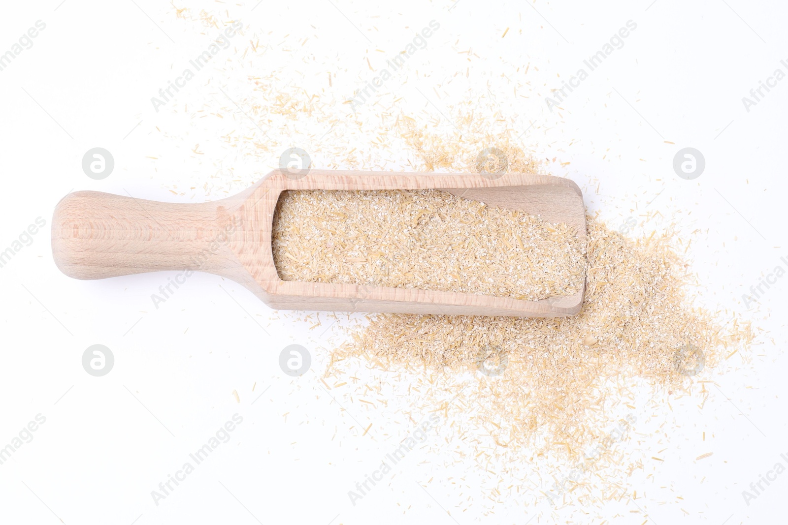 Photo of Scoop with oat bran isolated on white, top view