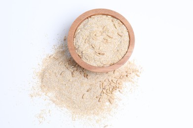 Photo of Oat bran in bowl and grains isolated on white, top view