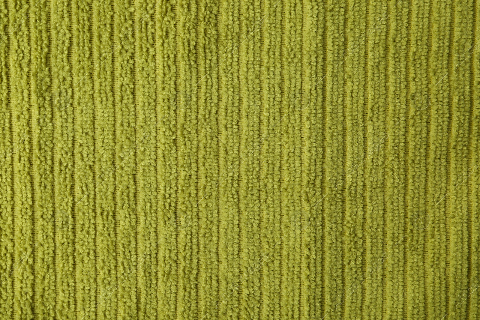 Photo of Clean green microfiber cloth as background, top view