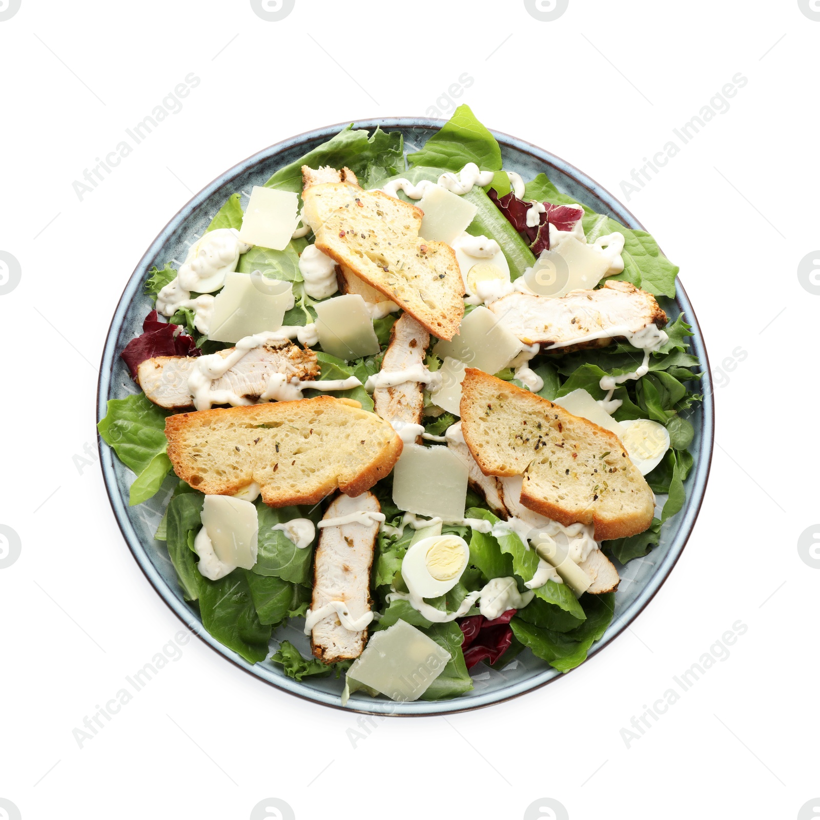 Photo of Tasty Caesar salad with chicken isolated on white, top view