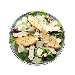 Tasty Caesar salad with chicken isolated on white, top view