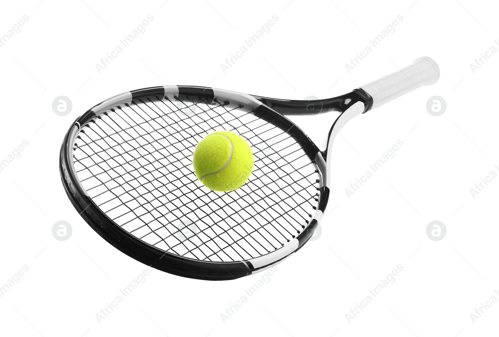 Photo of Tennis racket with ball isolated on white