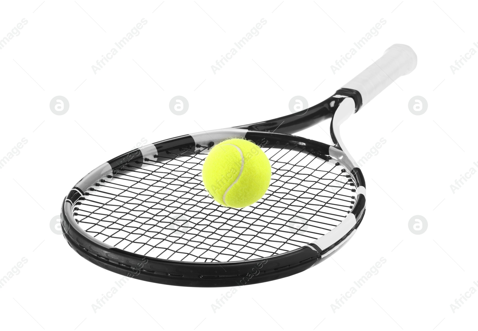 Photo of Tennis racket with ball isolated on white