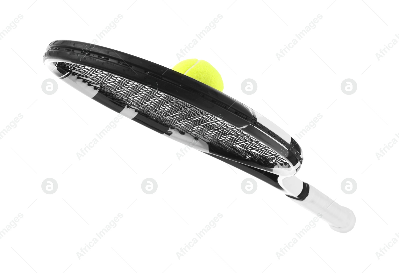 Photo of Tennis racket with ball isolated on white