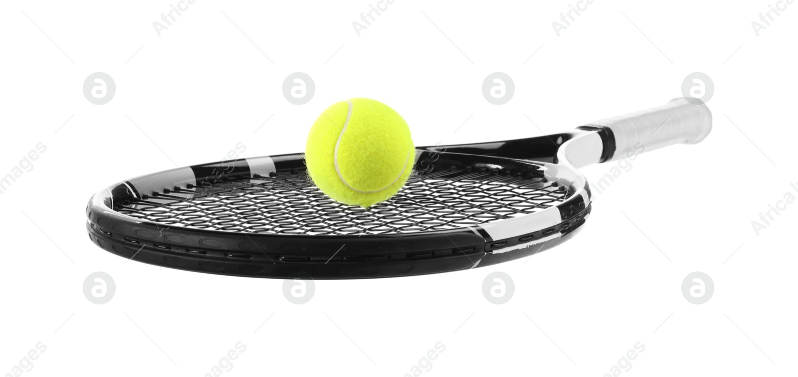 Photo of Tennis racket with ball isolated on white