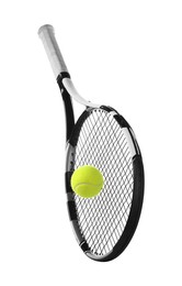 Photo of Tennis racket with ball isolated on white