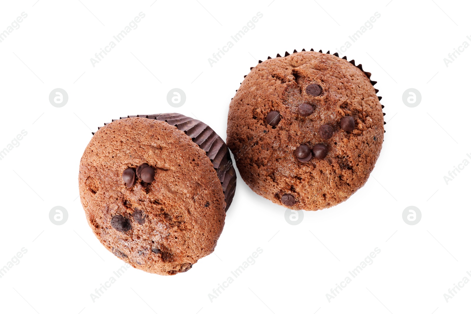 Photo of Delicious sweet muffins with chocolate chips isolated on white, top view