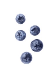 Photo of Many fresh ripe blueberries isolated on white