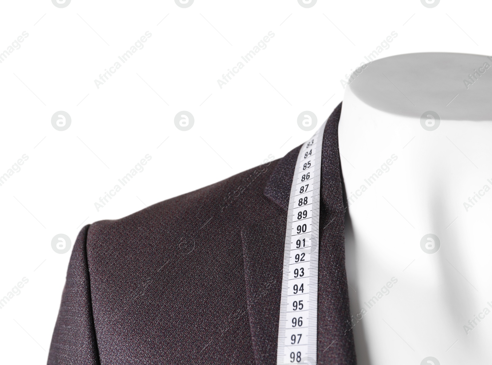 Photo of Mannequin with jacket and measuring tape isolated on white, closeup