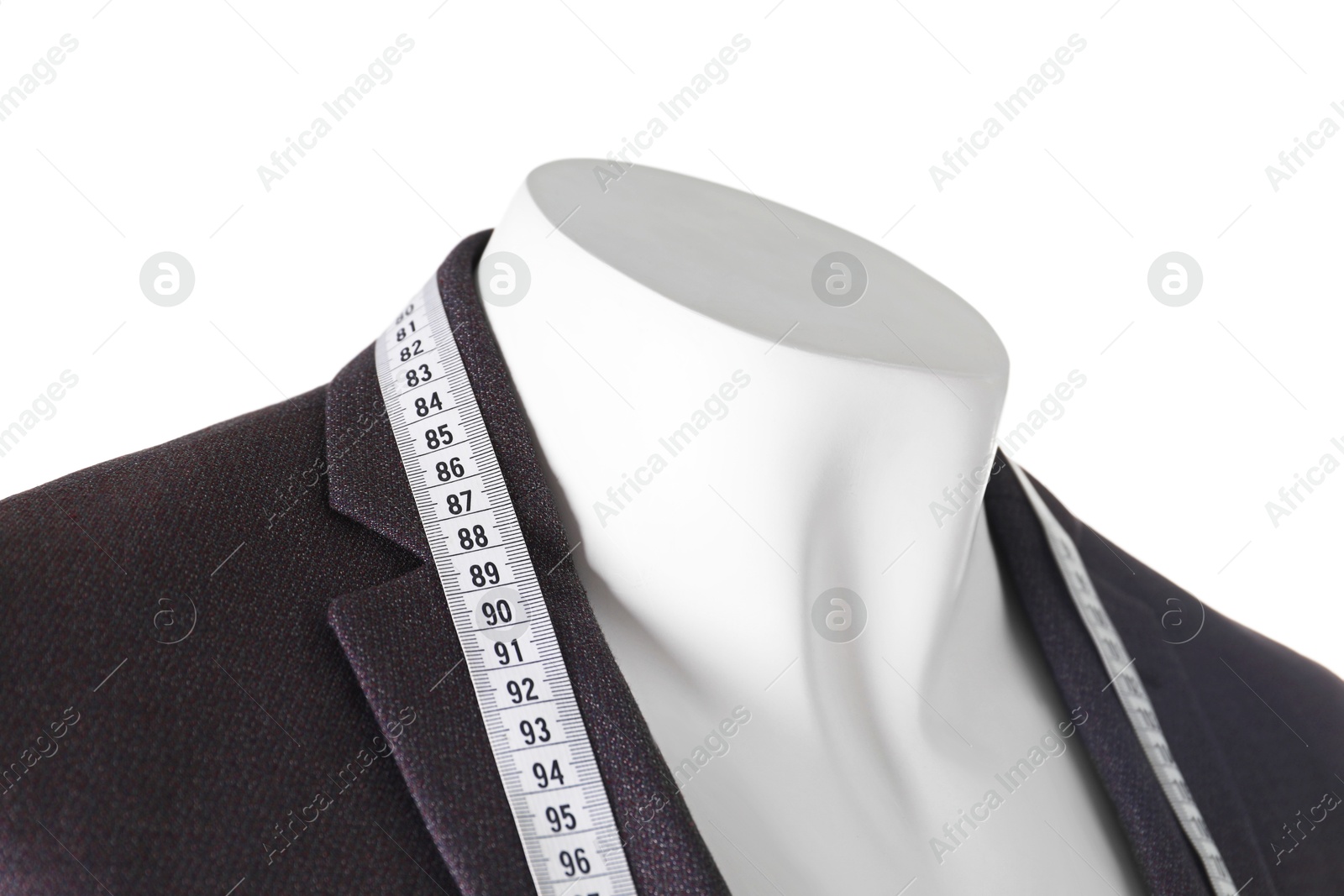 Photo of Mannequin with jacket and measuring tape isolated on white