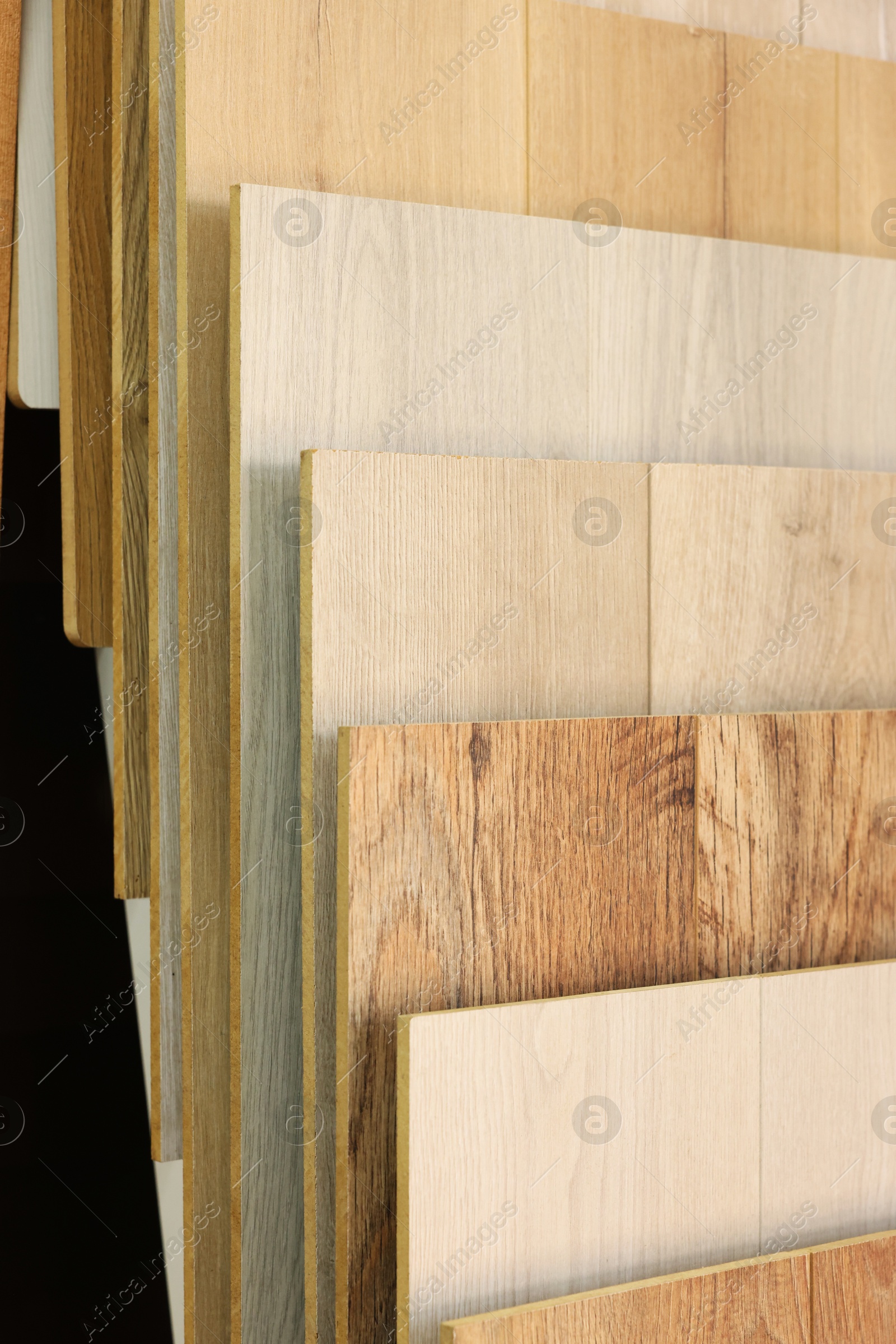 Photo of Many different samples of wooden flooring in store