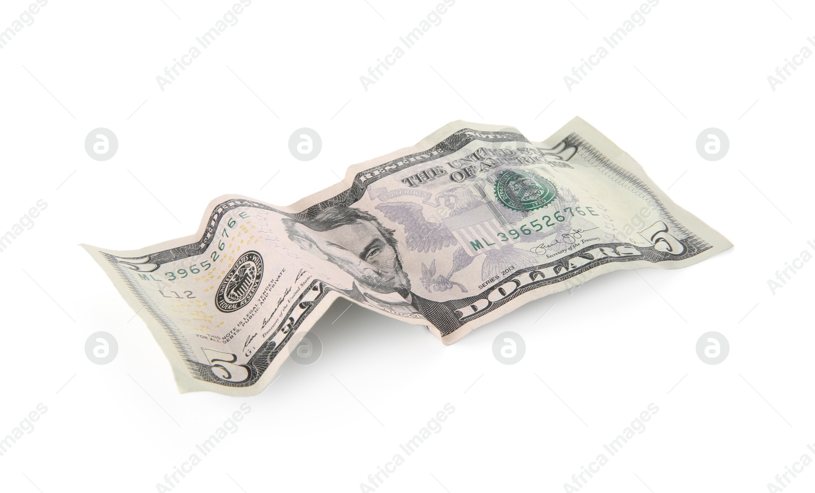 Photo of One crumpled dollar banknote isolated on white