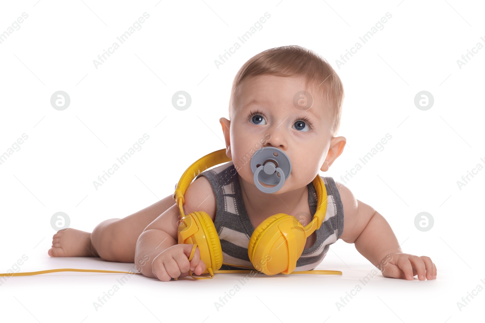 Photo of Cute little baby with pacifier and headphones on white background