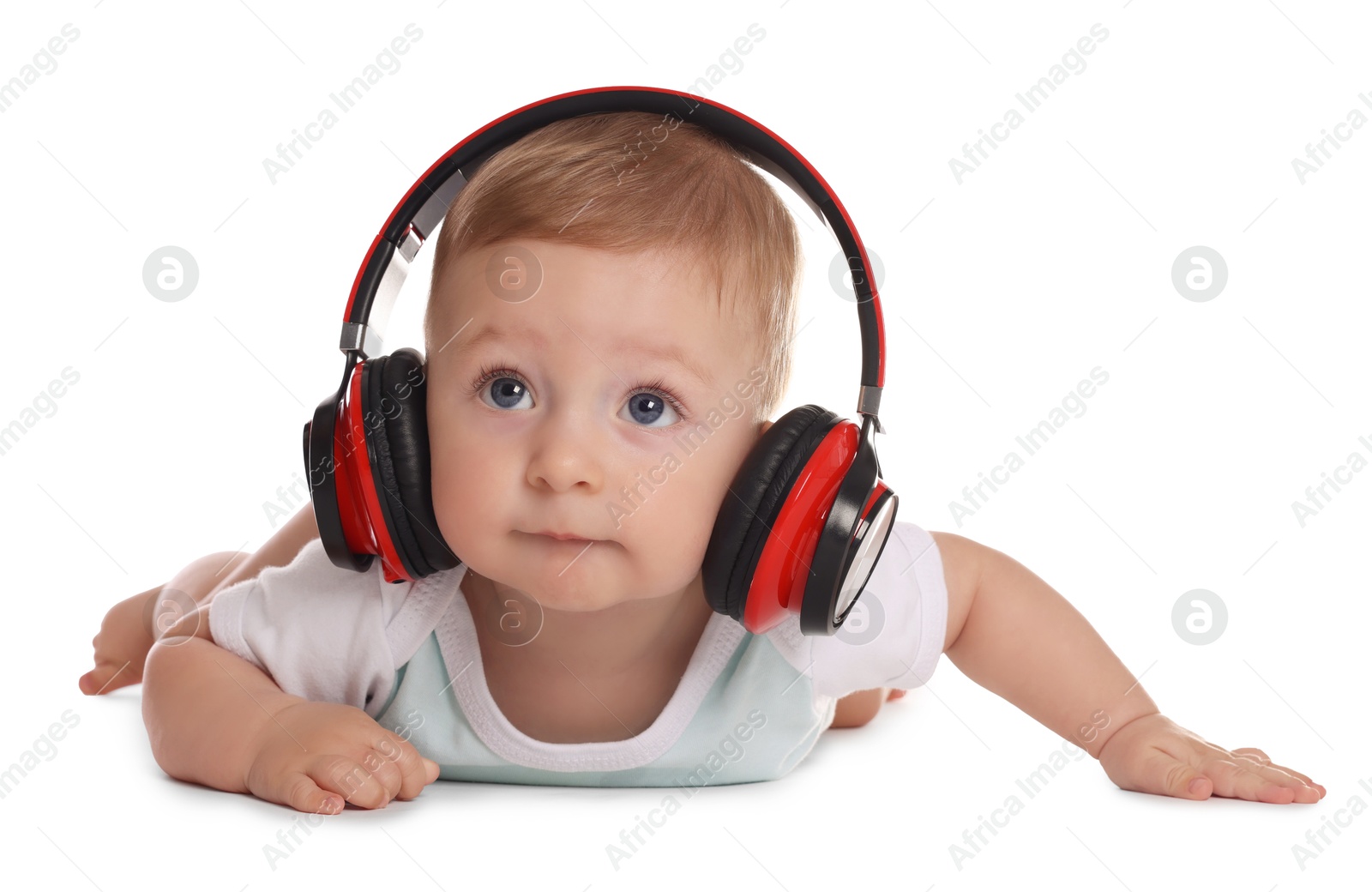 Photo of Cute little baby with headphones on white background