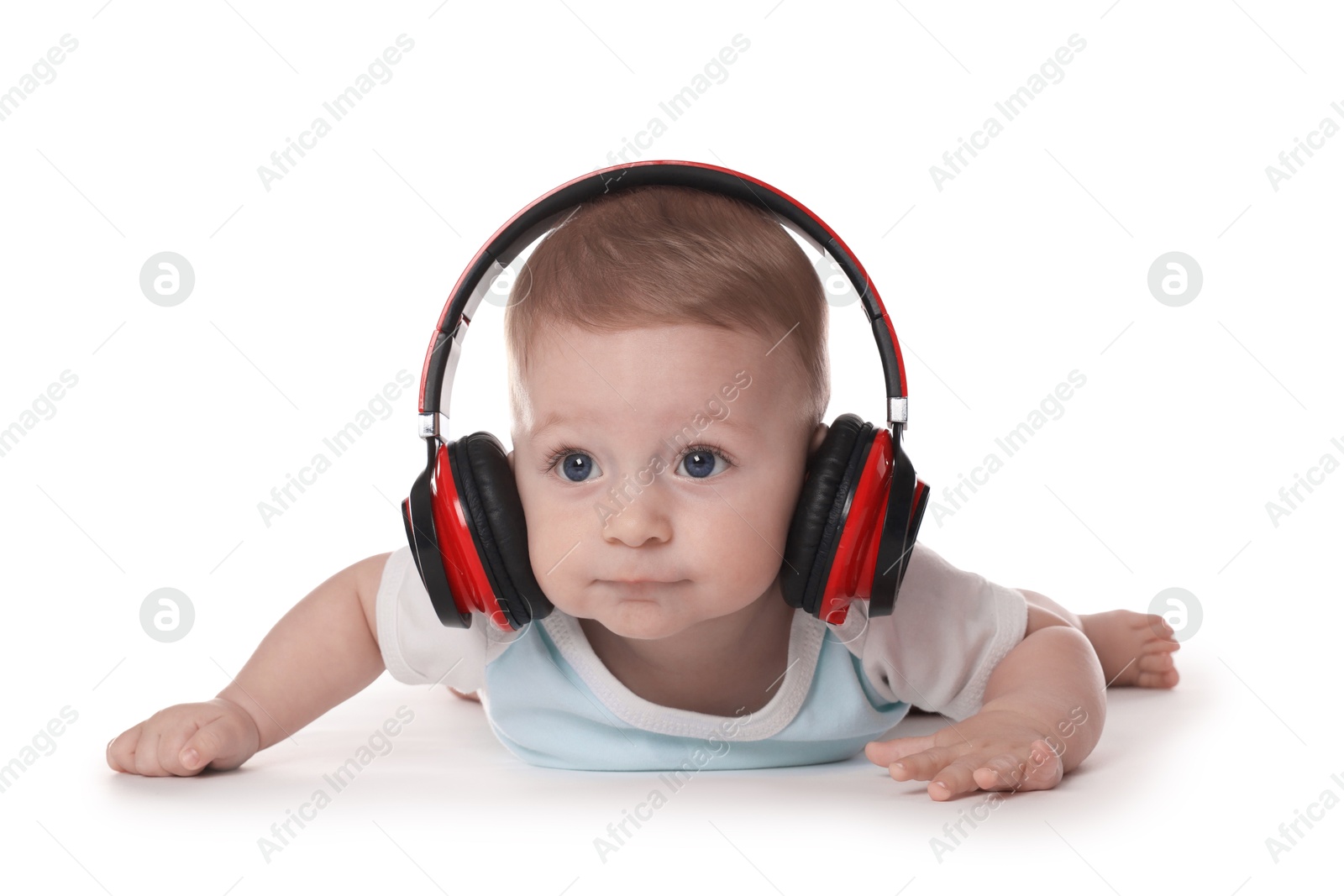 Photo of Cute little baby with headphones on white background