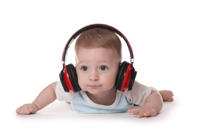 Cute little baby with headphones on white background