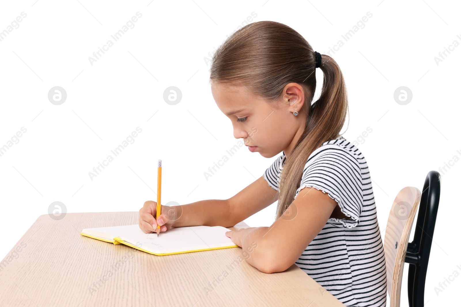 Photo of Girl with correct posture and notebook sitting at wooden desk on white background