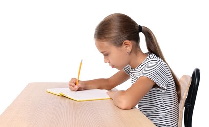 Girl with incorrect posture and notebook sitting at wooden desk on white background