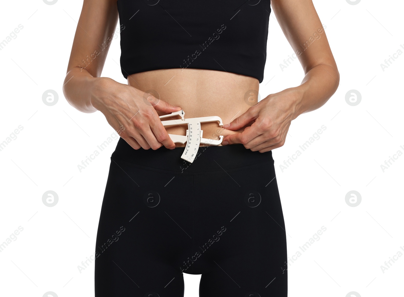 Photo of Woman measuring body fat with caliper on white background, closeup